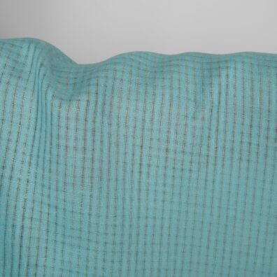 Ľanová látka tyrkysová s priehľadnými kockami na odevy, bytový textil